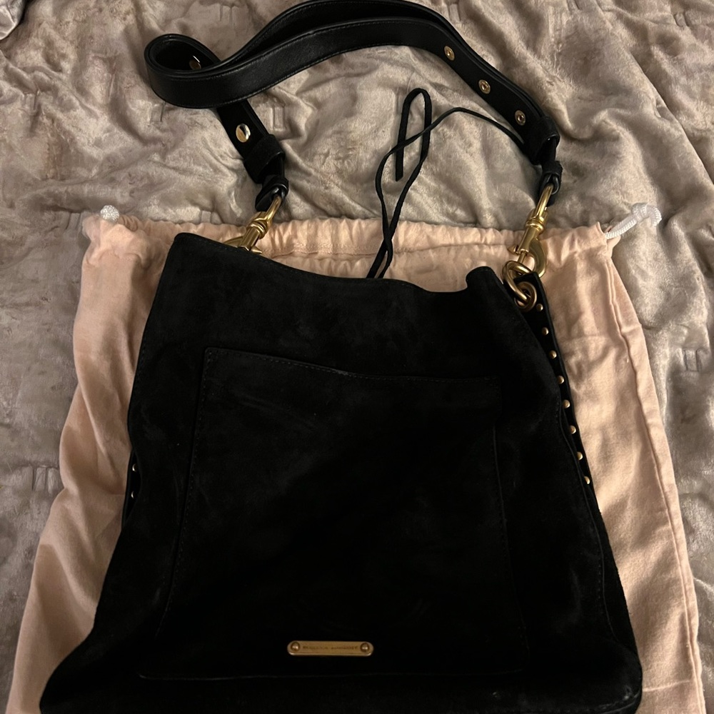 New black suede Rebecca Minkoff bag with gold hardware. Never used.